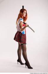 Tina STANDINGPOSE WITH DAGGER AND BASEBALL BAT 